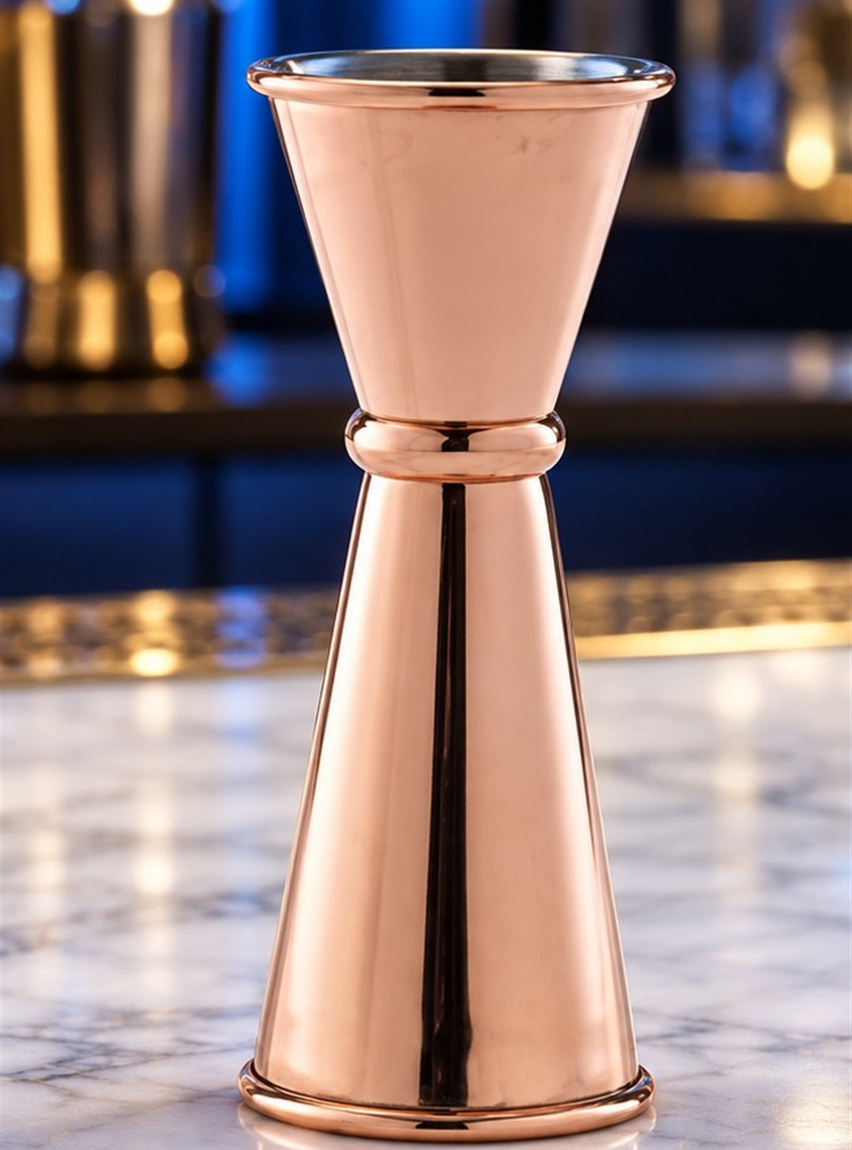 Jigger cuivre Genware EU 25/50 ml, vu de face sur fond clair