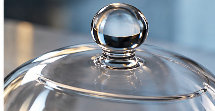 Cloche Cocktail Cover 100% chef, gros plan sur le bouton en verre