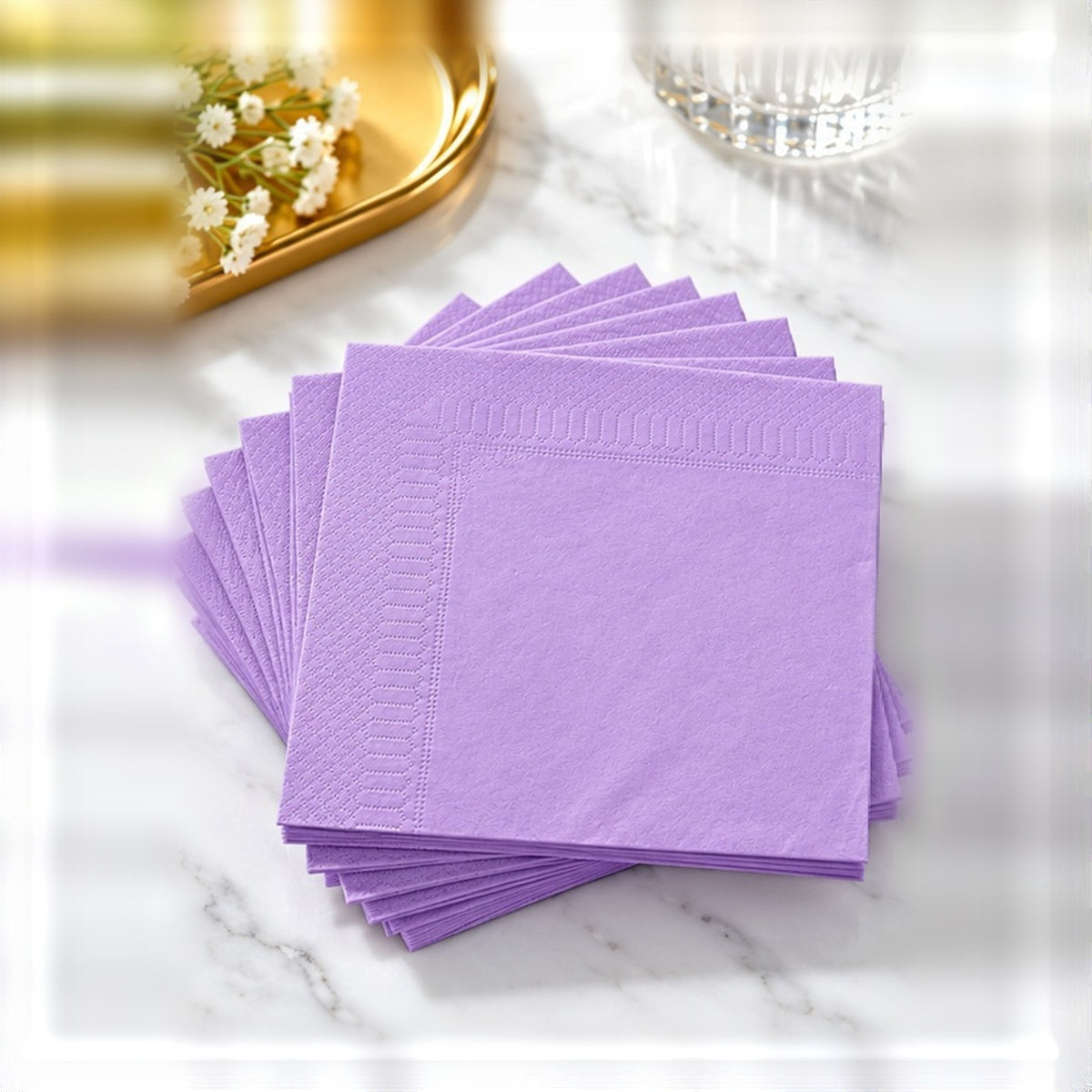 Serviettes en ouate lavande CGMP 20 × 20 cm, pack de 100, vu de face sur fond clair